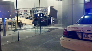 Illustration for article titled Car Crashes Directly into Chicago Apple Store (Updated)